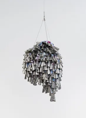 Marie Watt, Solstice (Crest), 2026, jingles, ribbon, mesh, 16" x 12" x 8"